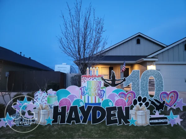 An image of a yard sign with a big number 10, the phrase "Happy Birthday Hayden" and other graphics around it.