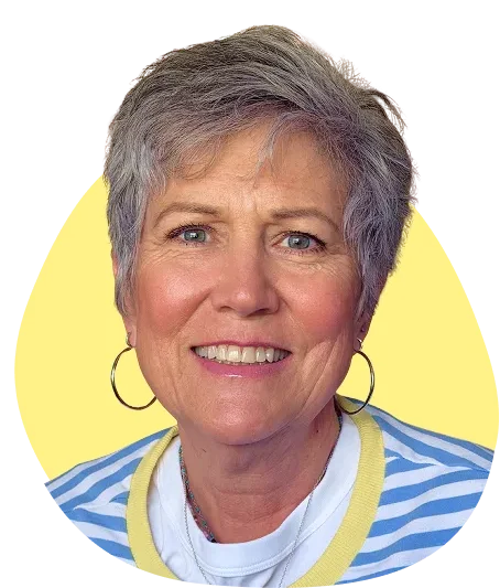 image of a woman smiling with a yellow shape behind her. Custom yard signs.